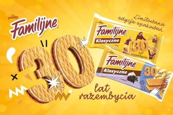Grafika promująca 30-lecie marki Familijne, przedstawiająca wafle w kształcie liczby 30 oraz dwie limitowane edycje opakowań ciastek Familijne Klasyczne na tle żółto-pomarańczowej, radosnej kompozycji.